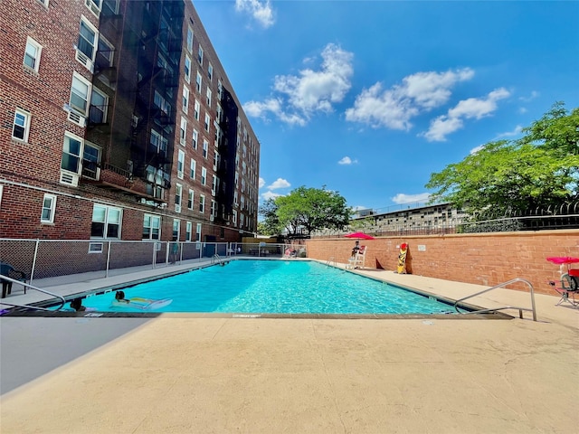 46-01 39th Ave Unit 106, Woodside, NY 11104 - community pool featuring a patio area