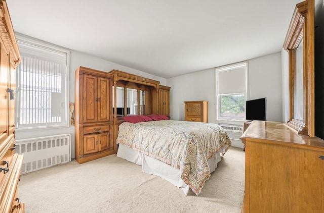46-01 39th Ave Unit 106, Woodside, NY 11104 - bedroom with radiator and light colored carpet