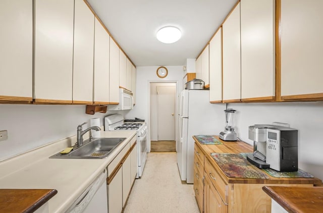 46-01 39th Ave Unit 106, Woodside, NY 11104 - kitchen featuring white appliances and white cabinets