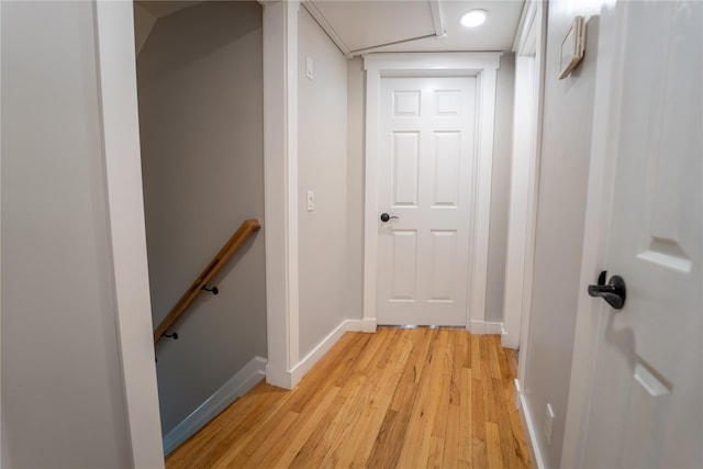 110 Roxbury Dr, Commack, NY 11725 - hall with an upstairs landing and light wood-style floors