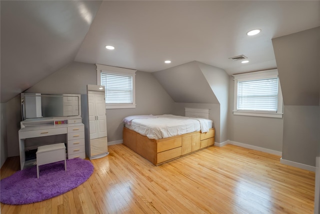 110 Roxbury Dr, Commack, NY 11725 - bedroom featuring light wood finished floors, vaulted ceiling, and recessed lighting