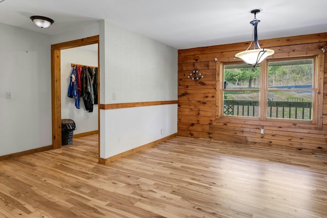 354 Sunset Hill Rd E, Fishkill, NY 12524 - empty room with wood finished floors and wooden walls