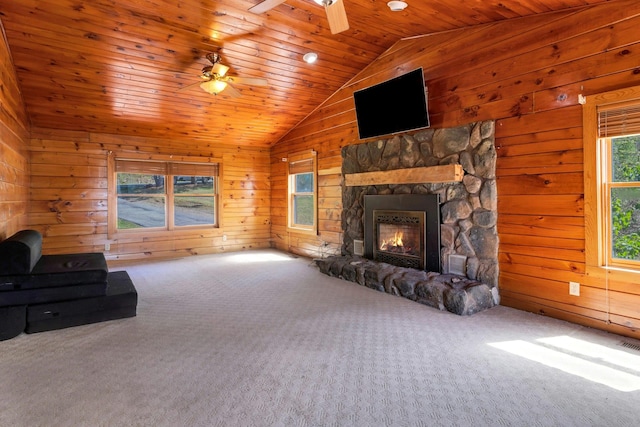 354 Sunset Hill Rd E, Fishkill, NY 12524 - unfurnished living room with lofted ceiling, a ceiling fan, wooden walls, carpet, and wooden ceiling