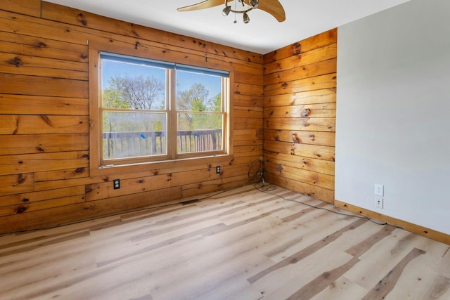 354 Sunset Hill Rd E, Fishkill, NY 12524 - empty room with wood finished floors, a ceiling fan, and wood walls