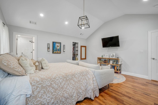 206 Brooksite Dr, Smithtown, NY 11787 - bedroom with wood finished floors, lofted ceiling, and recessed lighting