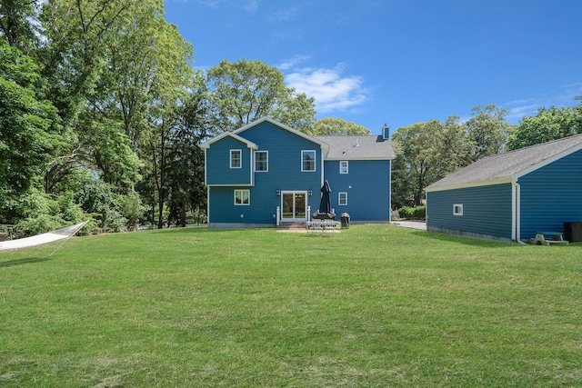 206 Brooksite Dr, Smithtown, NY 11787 - back of property with a yard