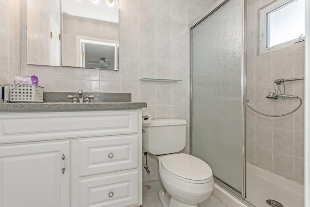 46 Pine St, Oceanside, NY 11572 - full bath with tile walls, a stall shower, vanity, and decorative backsplash