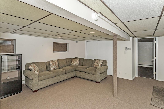 46 Pine St, Oceanside, NY 11572 - carpeted living room featuring a baseboard heating unit and a drop ceiling