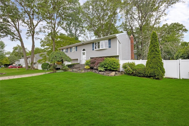 26 Shenandoah Blvd, Port Jefferson Station, NY 11776 - bi-level home with a chimney