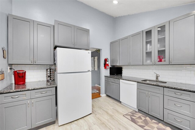 26 Shenandoah Blvd, Port Jefferson Station, NY 11776 - kitchen featuring white appliances, gray cabinets, tasteful backsplash, glass insert cabinets, and recessed lighting
