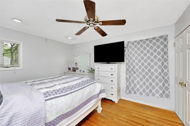 26 Shenandoah Blvd, Port Jefferson Station, NY 11776 - bedroom featuring light wood-type flooring, recessed lighting, ceiling fan, and a closet