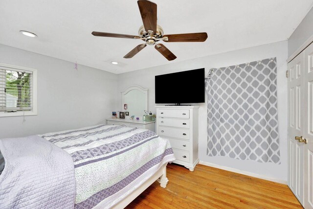 26 Shenandoah Blvd, Port Jefferson Station, NY 11776 - bedroom featuring light wood finished floors, recessed lighting, ceiling fan, and a closet