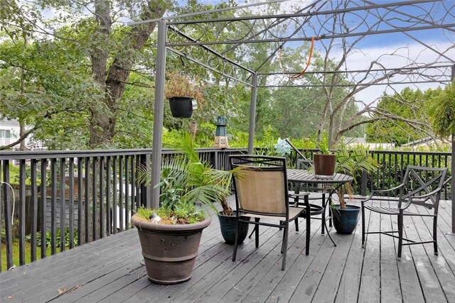 26 Shenandoah Blvd, Port Jefferson Station, NY 11776 - wooden deck featuring outdoor dining area