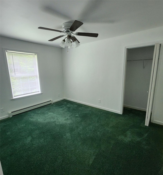 7219 State Rte 42, Grahamsville, NY 12740 - unfurnished bedroom featuring baseboard heating, dark colored carpet, a closet, and a ceiling fan