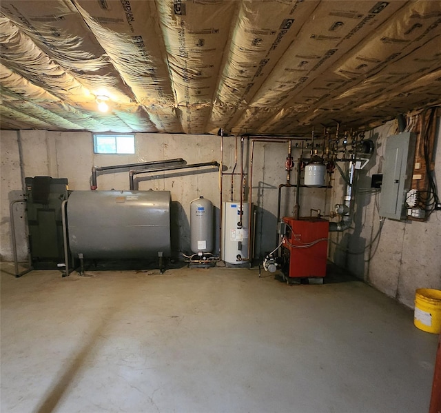 7219 State Rte 42, Grahamsville, NY 12740 - basement featuring oil tank, water heater, electric panel, a water pressure tank, and a heating unit