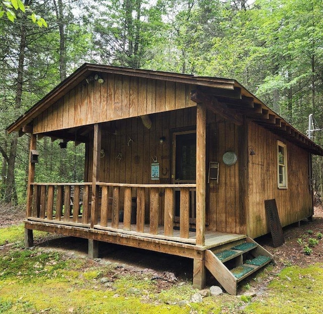 7219 State Rte 42, Grahamsville, NY 12740 - view of outdoor structure featuring a wooded view and covered porch