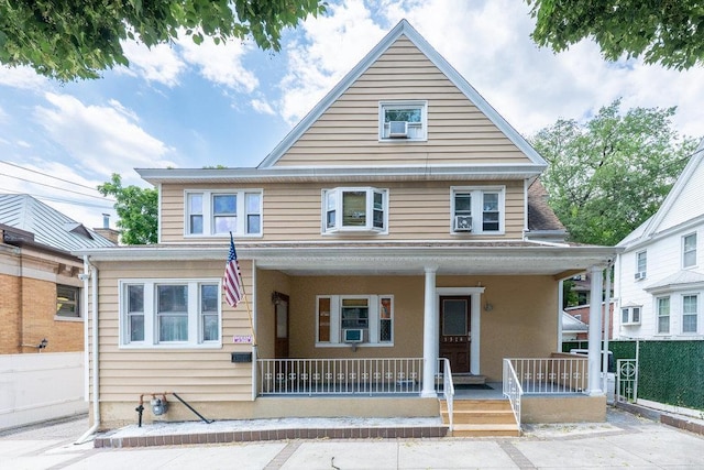 1314 College Point Blvd, College Point, NY 11356 - traditional style home featuring a porch