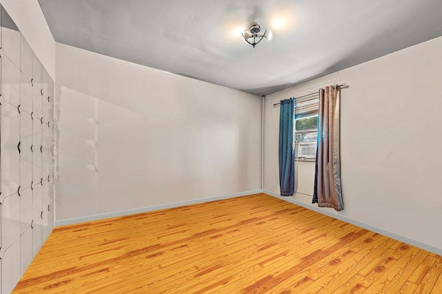 1314 College Point Blvd, College Point, NY 11356 - unfurnished room featuring wood finished floors and baseboards