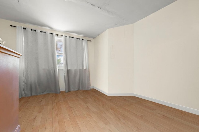 1314 College Point Blvd, College Point, NY 11356 - unfurnished room with wood-type flooring and baseboards