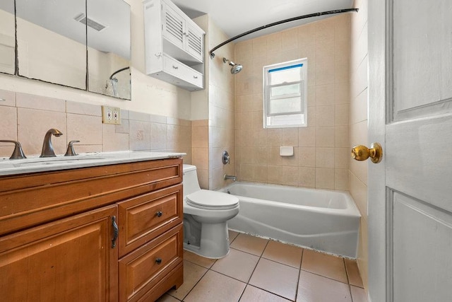 1314 College Point Blvd, College Point, NY 11356 - bathroom featuring tile patterned flooring, tile walls, vanity, and bathing tub / shower combination