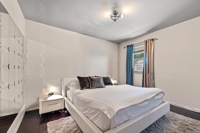 1314 College Point Blvd, College Point, NY 11356 - bedroom featuring wood finished floors and baseboards