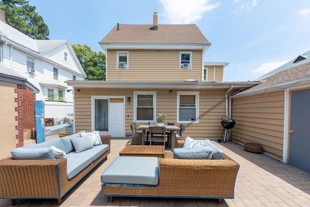 1314 College Point Blvd, College Point, NY 11356 - back of house with an outdoor living space, outdoor dining area, and a patio area