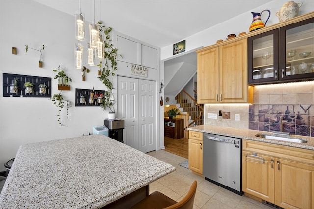 50 Corbin Hill Rd Unit 13, Fort Montgomery, NY 10922 - kitchen featuring dishwasher, backsplash, light brown cabinets, light stone counters, and glass insert cabinets