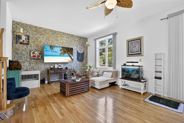 50 Corbin Hill Rd Unit 13, Fort Montgomery, NY 10922 - living room featuring an accent wall, a ceiling fan, light wood-style flooring, and wallpapered walls