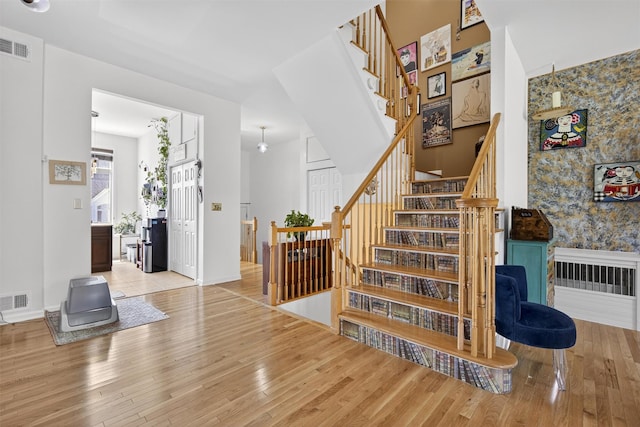 50 Corbin Hill Rd Unit 13, Fort Montgomery, NY 10922 - stairway with wood finished floors and wallpapered walls