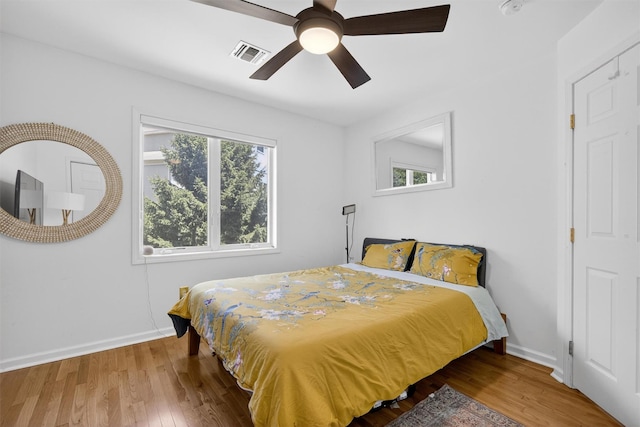 50 Corbin Hill Rd Unit 13, Fort Montgomery, NY 10922 - bedroom with multiple windows, wood finished floors, and ceiling fan