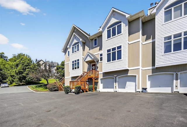 50 Corbin Hill Rd Unit 13, Fort Montgomery, NY 10922 - townhome / multi-family property featuring a garage and asphalt driveway