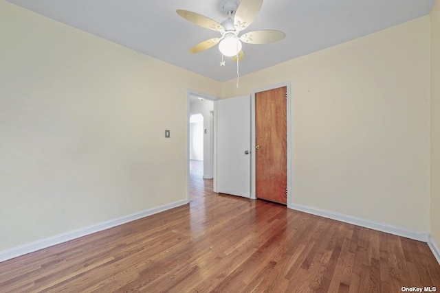 216 Raff Ave, Mineola, NY 11501 - spare room featuring ceiling fan and wood finished floors