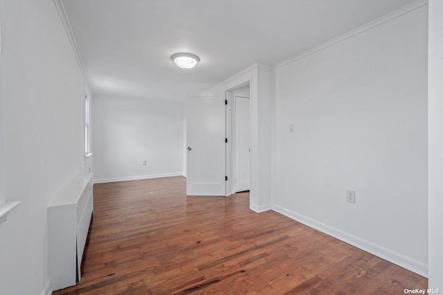 216 Raff Ave, Mineola, NY 11501 - empty room featuring wood finished floors and crown molding