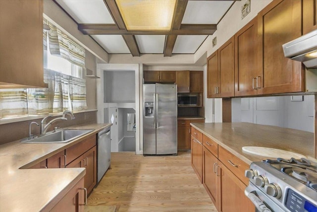 7 Wellesley Ave, Yonkers, NY 10705 - kitchen with appliances with stainless steel finishes, coffered ceiling, light wood-style flooring, brown cabinetry, and ventilation hood