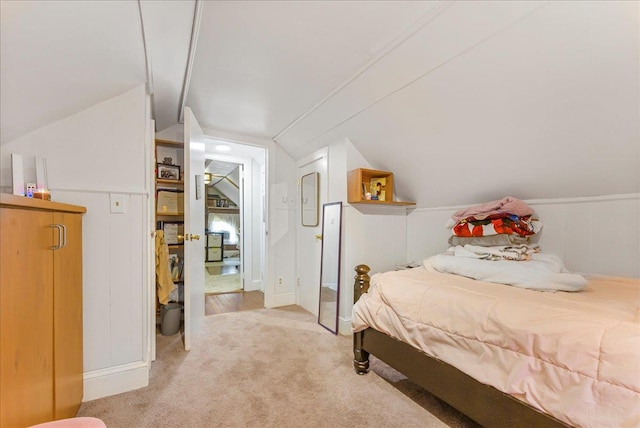 7 Wellesley Ave, Yonkers, NY 10705 - bedroom with vaulted ceiling, light carpet, and a decorative wall