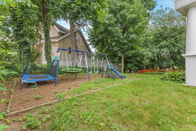 7 Wellesley Ave, Yonkers, NY 10705 - view of green lawn featuring a playground and a trampoline