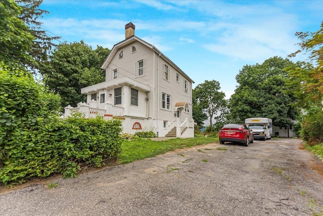 7 Wellesley Ave, Yonkers, NY 10705 - view of home's exterior featuring a chimney