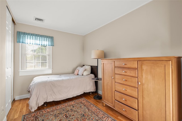 1942 Lilac Dr, Westbury, NY 11590 - bedroom featuring light wood-style flooring