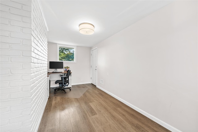 1942 Lilac Dr, Westbury, NY 11590 - office with wood finished floors and baseboards