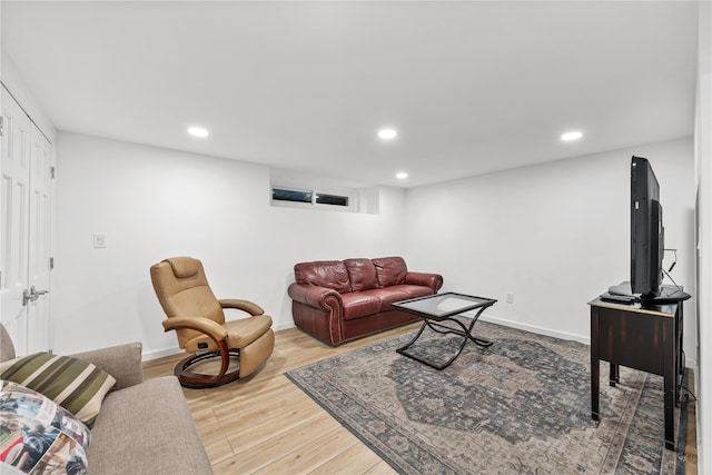1942 Lilac Dr, Westbury, NY 11590 - living area featuring recessed lighting and wood finished floors