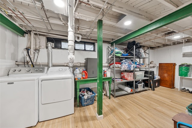 1942 Lilac Dr, Westbury, NY 11590 - unfinished basement featuring washer and dryer and wood finished floors