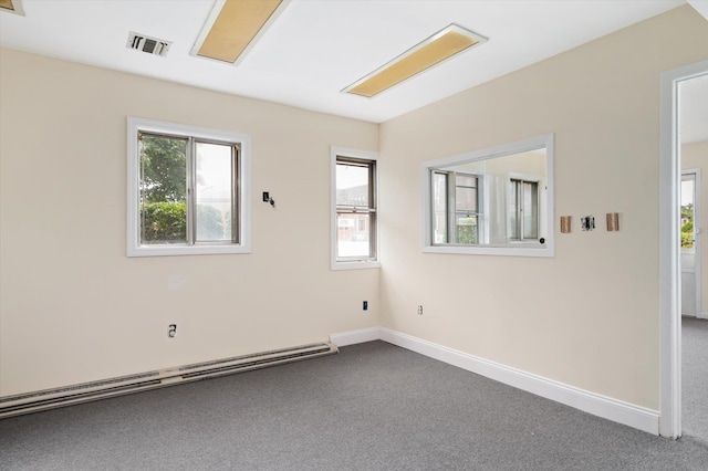 1901 New Hyde Park Rd, New Hyde Park, NY 11040 - carpeted spare room featuring baseboard heating and baseboards