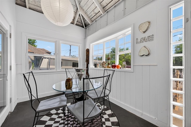 16 Broadway, Loch Sheldrake, NY 12759 - dining area featuring lofted ceiling and a wainscoted wall