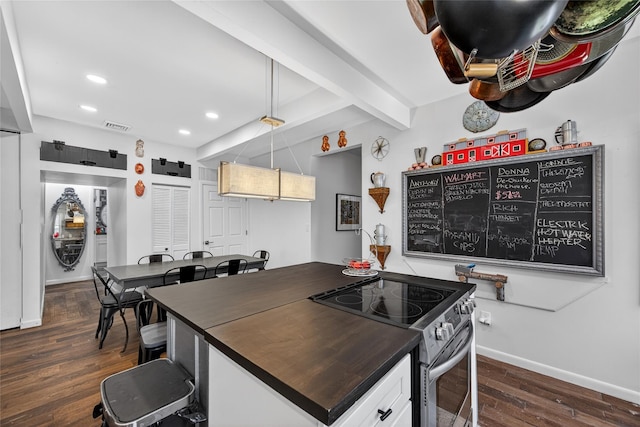16 Broadway, Loch Sheldrake, NY 12759 - kitchen featuring electric stove, beamed ceiling, recessed lighting, dark wood-style flooring, and white cabinets