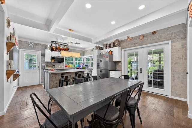 16 Broadway, Loch Sheldrake, NY 12759 - dining space featuring hardwood / wood-style floors, french doors, beamed ceiling, healthy amount of natural light, and recessed lighting