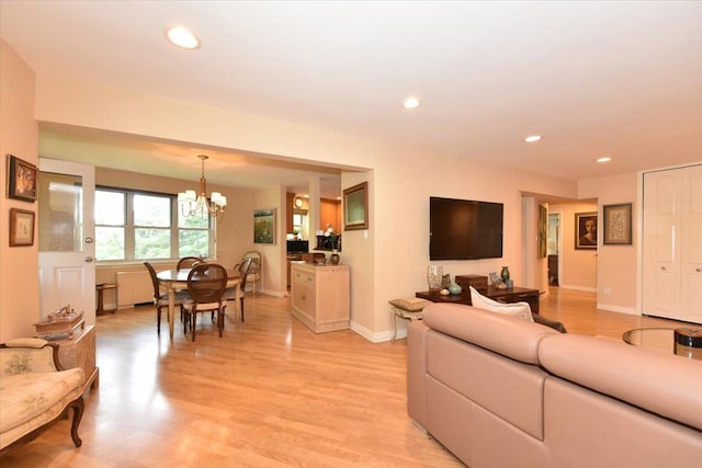 180 S Middle Neck Rd Unit 1-Q, Great Neck, NY 11021 - living room with a chandelier, light wood-style flooring, and recessed lighting