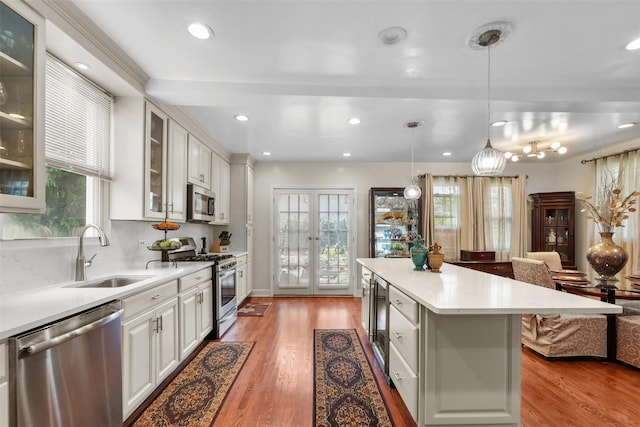194 Valentine St, Yonkers, NY 10704 - kitchen with stainless steel appliances, plenty of natural light, light countertops, and recessed lighting