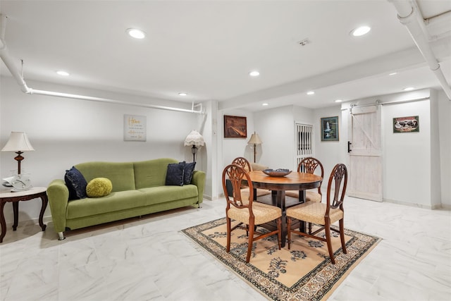 194 Valentine St, Yonkers, NY 10704 - dining space featuring recessed lighting, a barn door, and light marble finish flooring