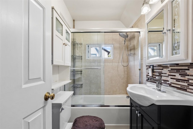 194 Valentine St, Yonkers, NY 10704 - bathroom featuring vanity, backsplash, and enclosed tub / shower combo
