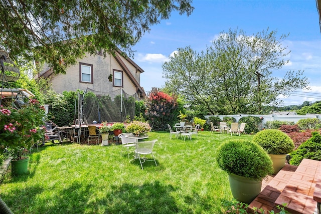 194 Valentine St, Yonkers, NY 10704 - view of green lawn with a trampoline